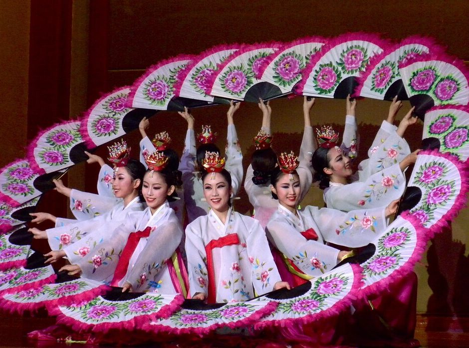 Korean Buchaechum fan dancers performing at a cultural event